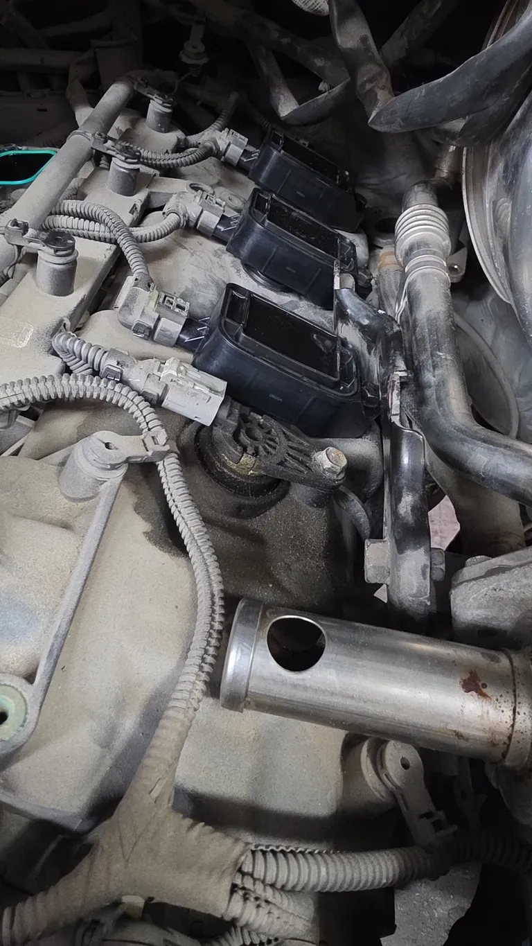 Ignition coils exposed during misfire repair on a 2022 Ram 1500