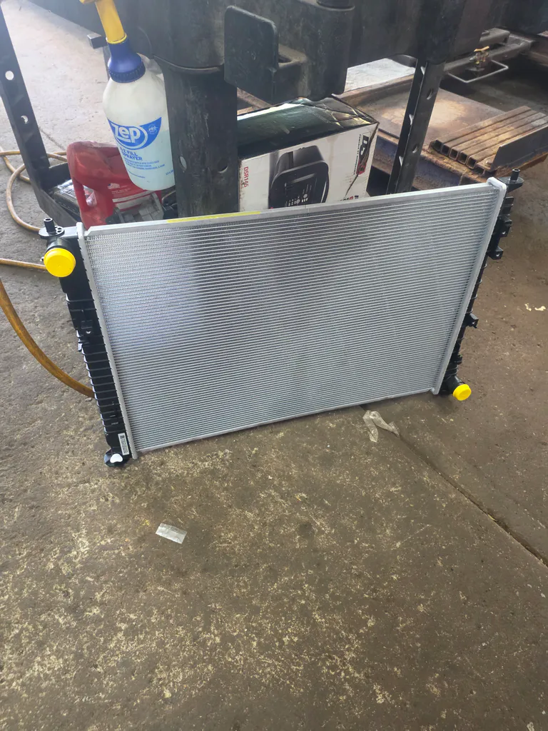 Replacement radiator during a Hyundai cooling-system repair
