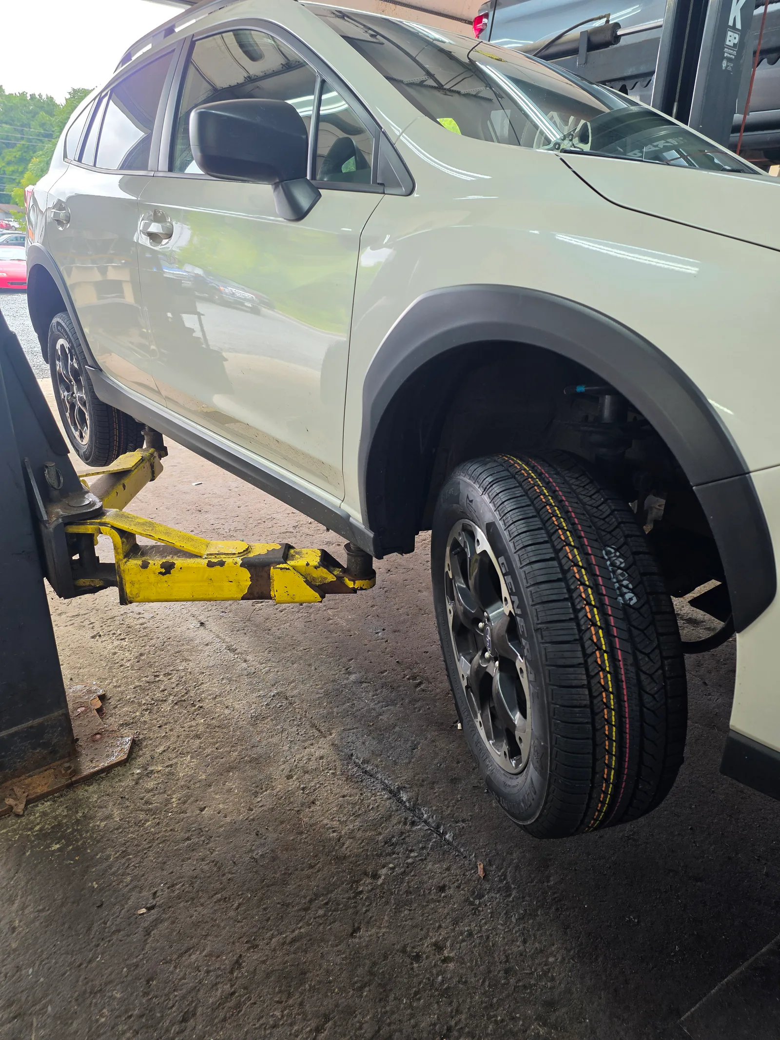 2023 Subaru Crosstrek with new tires installed at Wrenches